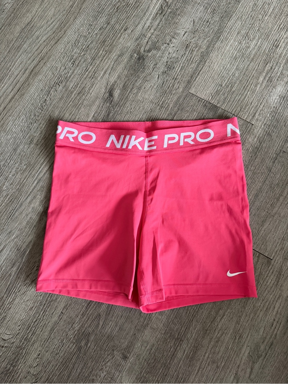 Nike Pro Women's Hot Pink Bike Shorts with White Logo